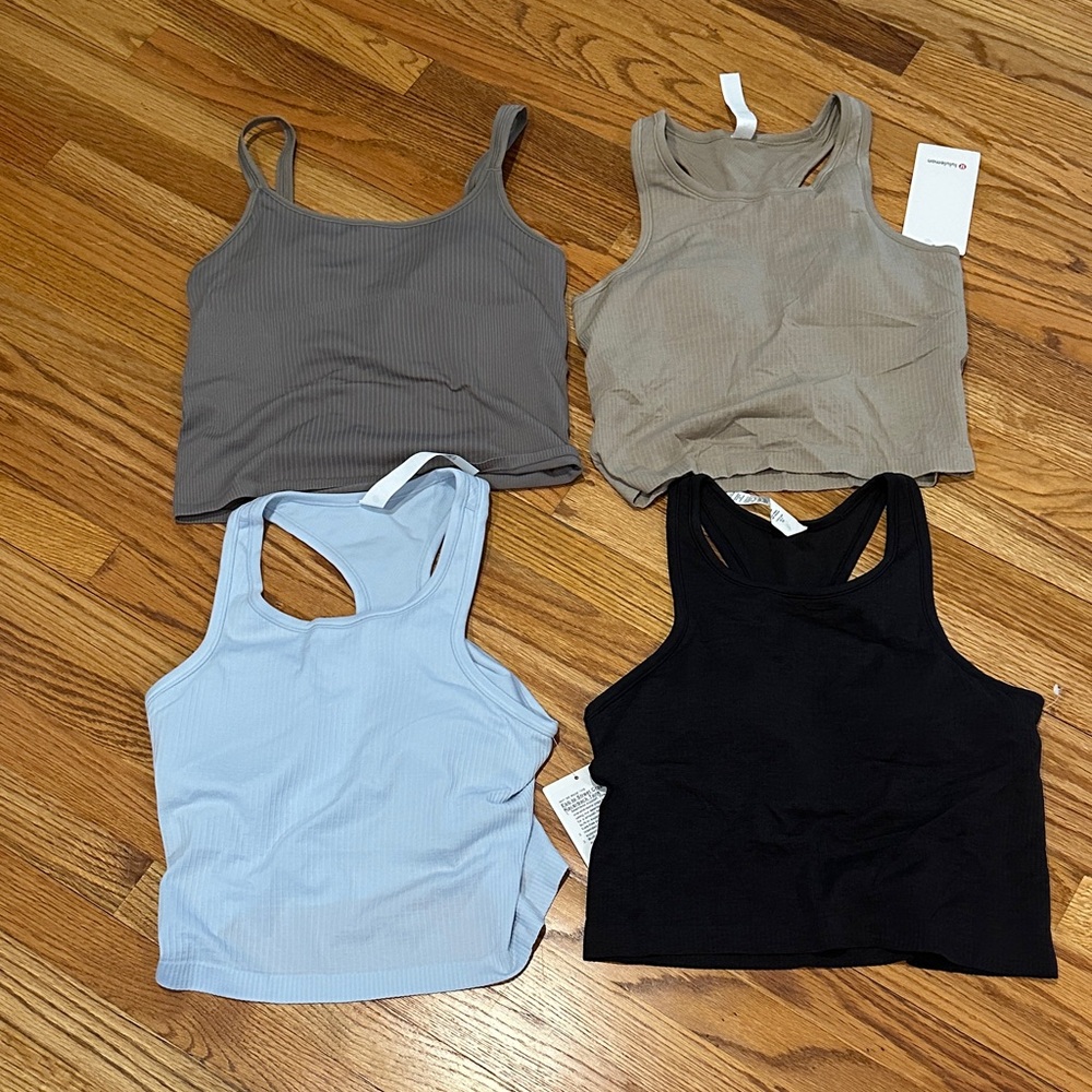 Set of 4 Lulelemon Ebb to Street Tanks Size 10- Taupe, Light Blue, Black, Gray